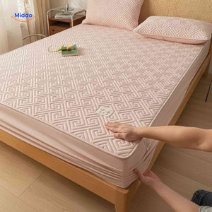 protège-matelas fin avec couche matelassée légère pour un confort discret toute la nuit