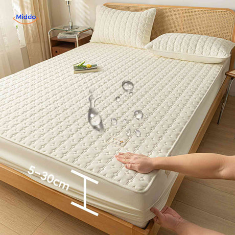 protège-matelas imperméable avec hauteur de jupe variable s'adaptant aux matelas épais
