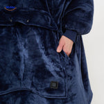 pull chauffant bleu avec bouton de contrôle intégré pour régler l'intensité