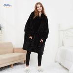 pull chauffant noir coupe confortable et ajustée, tenue lifestyle en situation