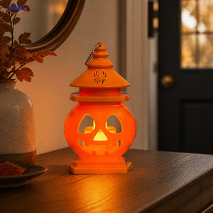 PumpkinGlow™ Château à lueur chaude, lanterne d’Halloween double face dans une entrée