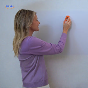 règle à niveau à bulle pour accrocher précisément un tableau sans mesurer