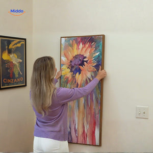 règle à niveau en situation pour accrocher facilement un tableau droit au mur