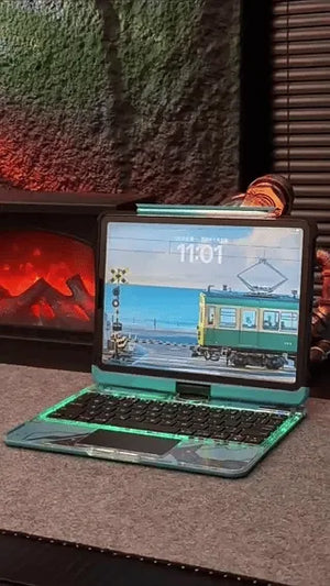 coque iPad clavier rétro éclairé bleu avec design thème train, touches rétroéclairées