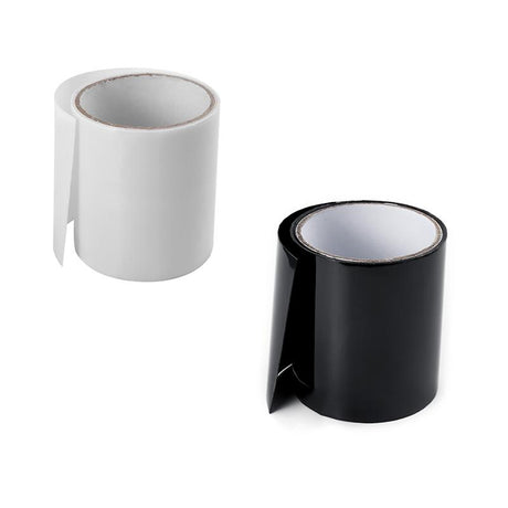 deux rouleaux de ruban étanche magique, coloris blanc et noir, côte à côte