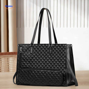 sac cabas noir matelassé au look cuir luxe, style shopper tendance pour femme