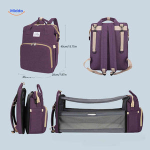 sac à langer violet avec lit pliable intégré et guide des dimensions pour bébé