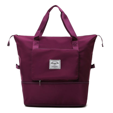sac de voyage étanche et extensible en coloris bordeaux prune