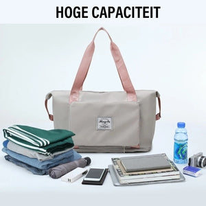 sac de voyage extensible coloris gris montrant sa grande capacité et les affaires pouvant y entrer