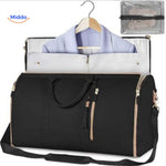 sac de voyage compact luxe en coloris noir, photo produit fond épuré