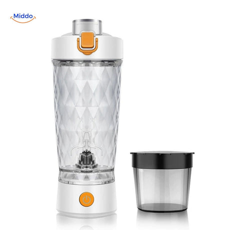 shaker électrique coloris blanc avec conteneur à suppléments détachable posé à côté