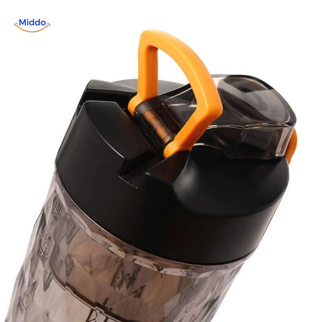 shaker électrique avec poignée orange et bouchon de transport anti-fuite pour nomades