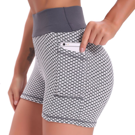 short de yoga taille haute coloris gris, coupe gainante et respirante pour femme