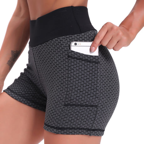 short de yoga taille haute coloris noir, coupe gainante jacquard pour femme active