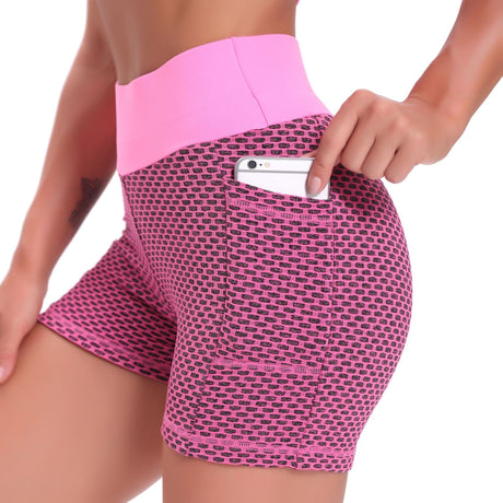 short de yoga taille haute coloris rose, tissu gainant et taille haute confort