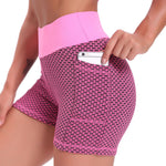 short de yoga taille haute coloris rose, tissu gainant et taille haute confort