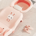 siège de bain bébé avec motif lapin et chaussons décoratifs, design adorable pour les tout-petits