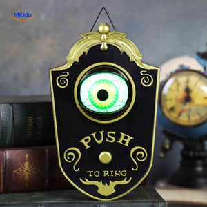 sonnette noire avec oeil vert brillant pour décoration halloween à la porte