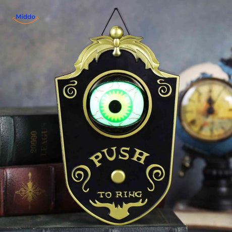 sonnette noire avec oeil vert brillant pour décoration halloween à la porte