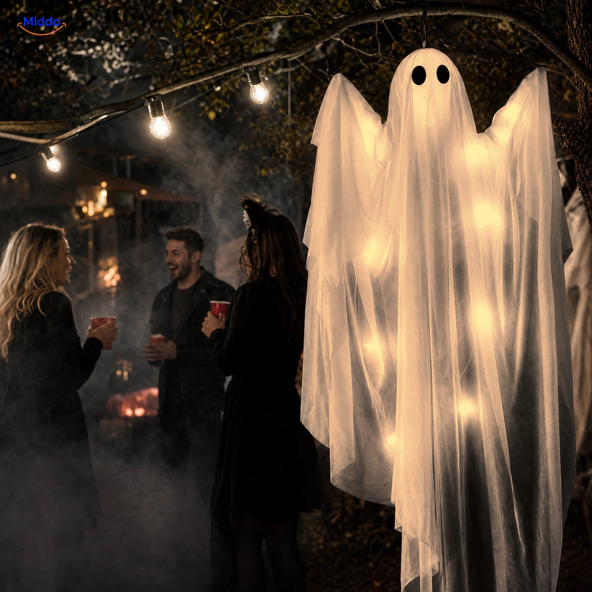 SpookGlow™ avec éclairage fantôme blanc chaud lors d’une fête d’Halloween