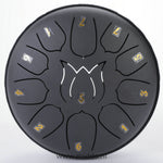 steel tongue drum noir 15 cm avec notes chiffrées sur fond blanc