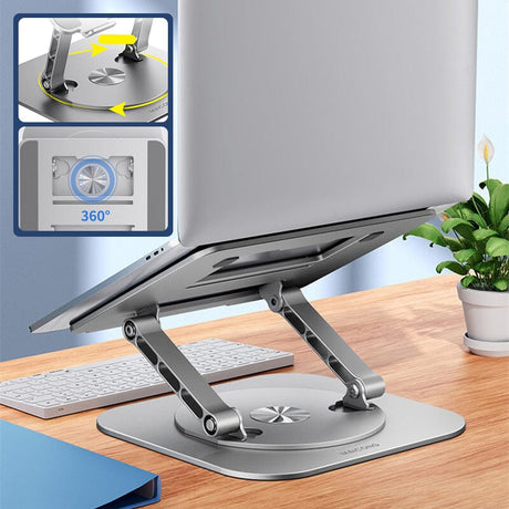 support pivotant 360° avec ordinateur portable, clavier et plante sur un bureau