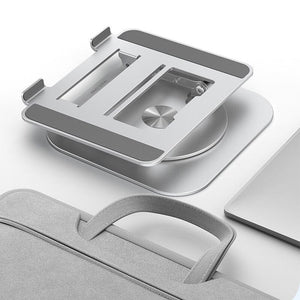 support pliable pour ordinateur portable posé à côté d'un sac sur une surface blanche