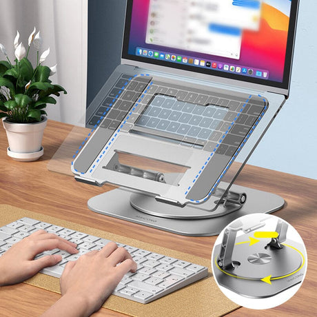 support pivotant 360° pour ordinateur portable posé sur un bureau avec des plantes et un clavier
