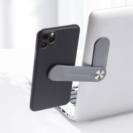 support téléphone magnétique gris fixé sur le côté d'un ordinateur portable pour second écran