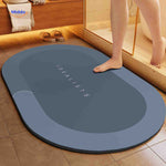 tapis de bain ovale antidérapant et absorbant, coloris bleu-gris