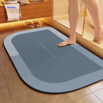 tapis de bain rectangulaire bleu-gris, vue du dessous avec revêtement antidérapant