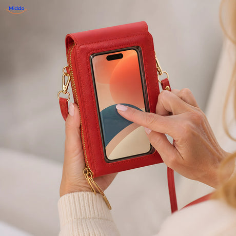Utilisation du téléphone à travers la fenêtre transparente du sac TouchScreenGo rouge