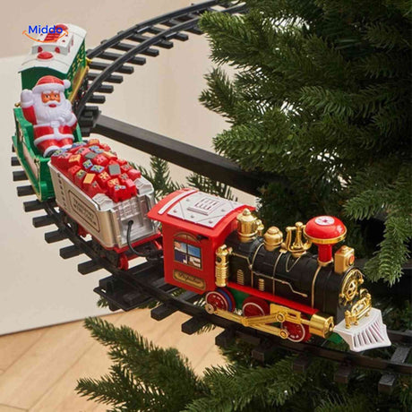 train de noël sur circuit circulaire avec wagons autour du sapin