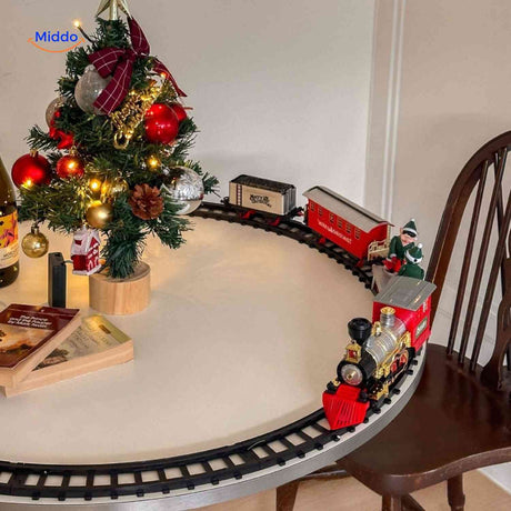 train de noël miniature faisant le tour du sapin, vue d'ensemble en situation