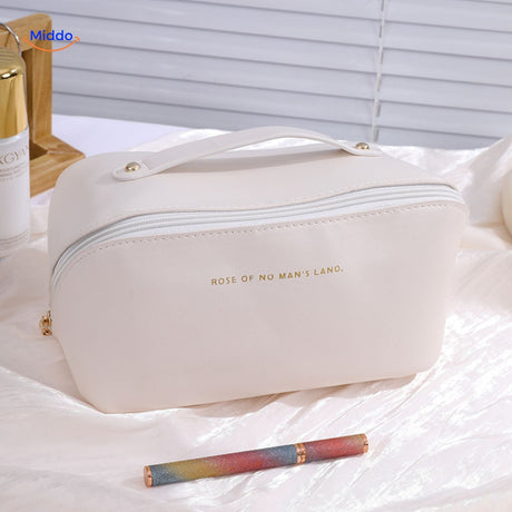 trousse de maquillage blanc cassé imperméable, design épuré pour voyager avec style