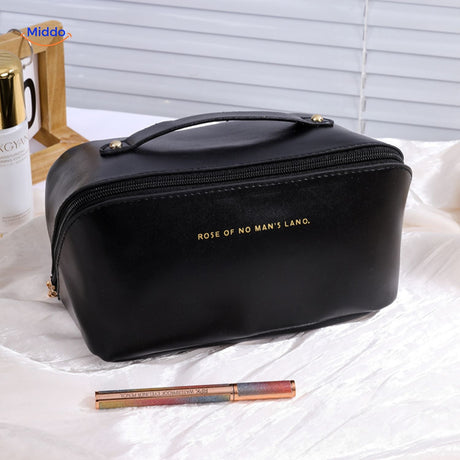 trousse de maquillage noire imperméable et étanche, indispensable pour voyager sans stress