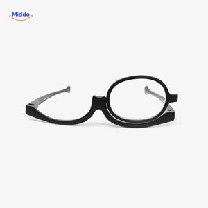 vue de face des lunettes maquillage noires à lentille unique pivotante, gros plan